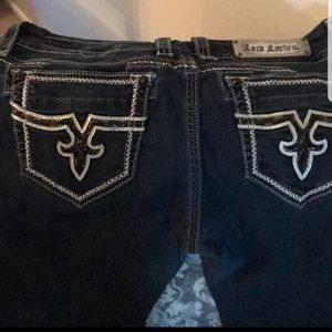 Dark blue rock and revival jeans